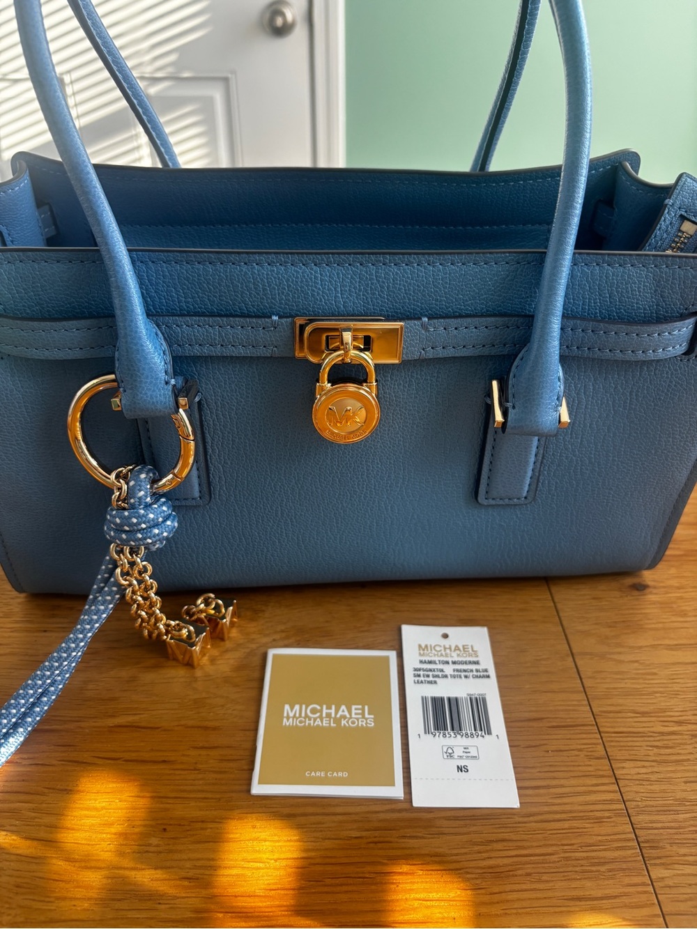Michael Kors Sky Blue Leather Tote with Gold Hardware and Charm